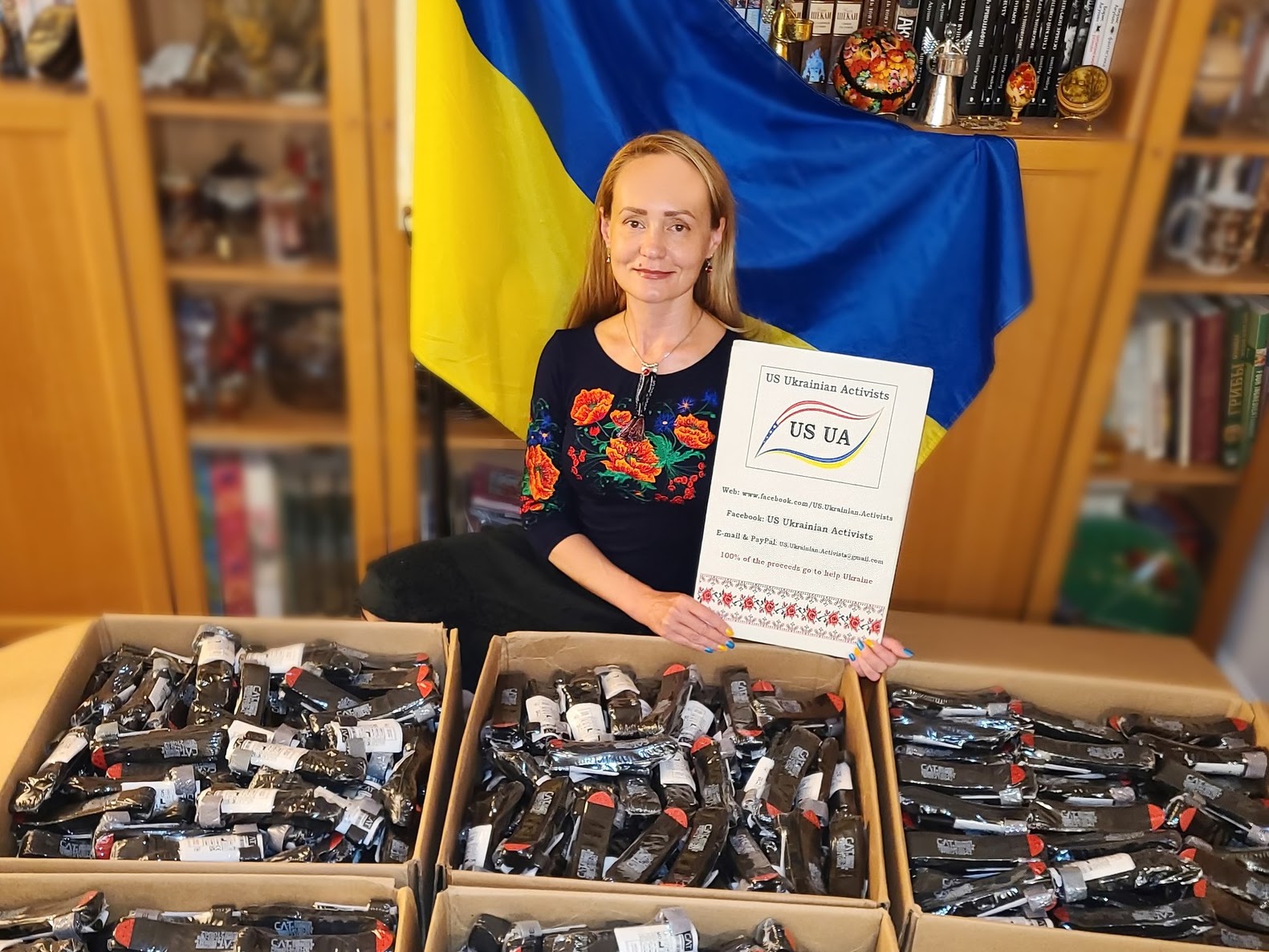 USUA's president, Nadiya Shaporynska, displays humanitarian and medical aid about to be shipped from the US to Ukraine